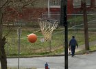 RoadBasketball1 copy  Shuronica Brewer, 8, left, and her cousin Amaysha Brewer, 8, right, play a game of basketball together in the road in front of the Brewer home in Spartanburg, SC Monday afternoon, 3-15-05.  (AP Photo/Spartanburg Herald-Journal/Tim Kimzey)